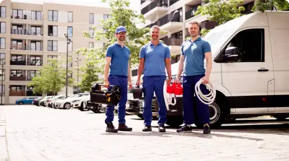 Workers standing by service van